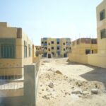 Vacant apartment blocks in New Fayoum, Egypt – unoccupied housing in a planned new town, 2012