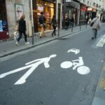 Pedestrian priority street in Paris – urban shared space reclaimed from car traffic, France, 2014