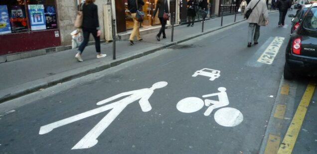Pedestrian priority street in Paris – urban shared space reclaimed from car traffic, France, 2014