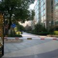 Gated entry of a private residential compound in Xujiahui, Shanghai, China – urban enclosure, 2014