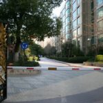 Gated entry of a private residential compound in Xujiahui, Shanghai, China – urban enclosure, 2014
