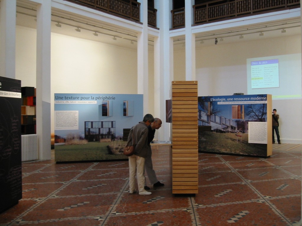 Visitors at the Vorarlberg sustainable architecture exhibition, Palais de la Porte Dorée, Paris, 2003 © ARR